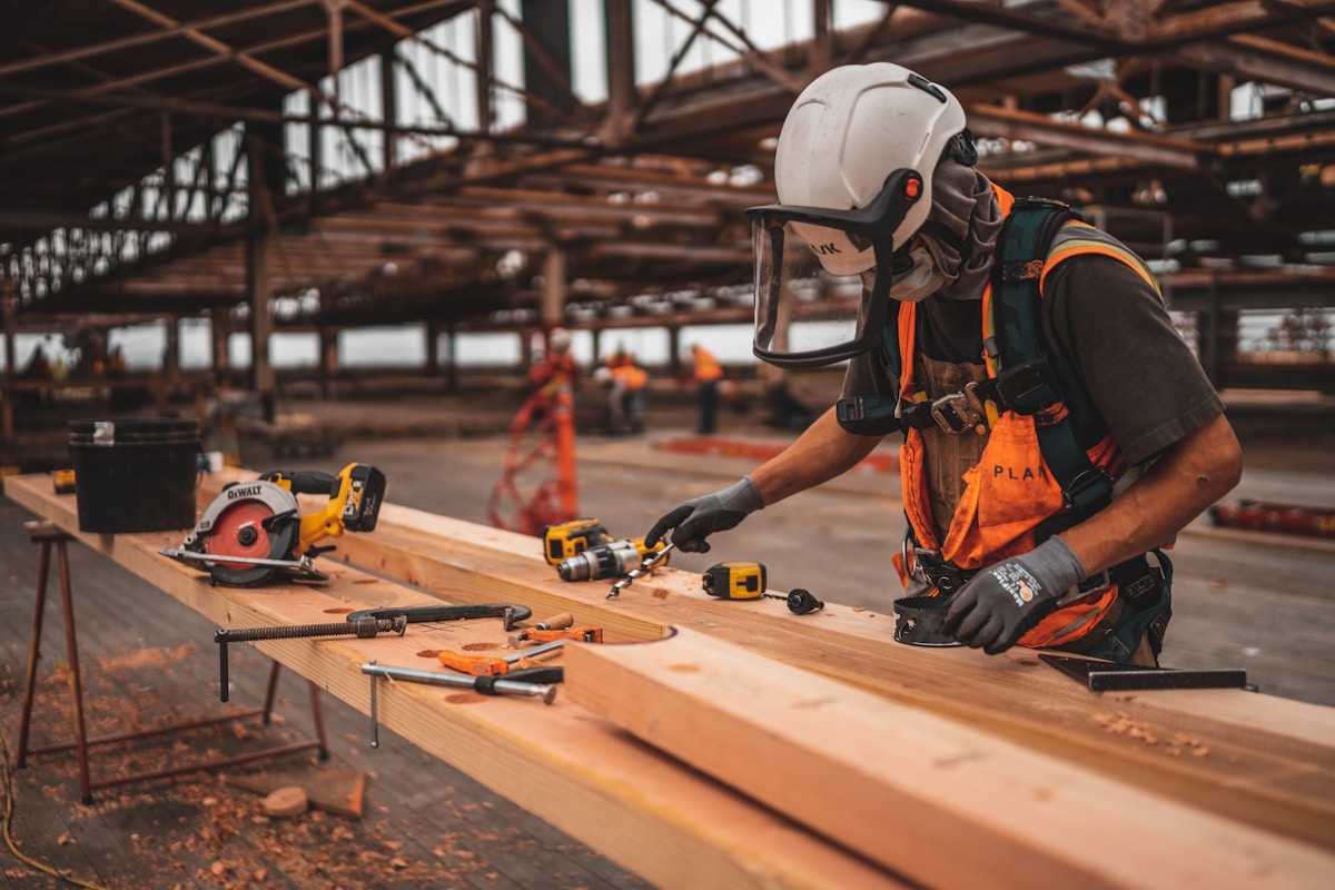 Tradesman on site with a power tool