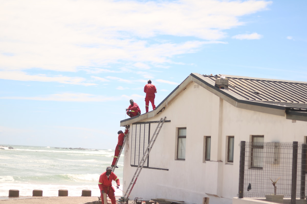 Catwall tradesmen at work on a roof