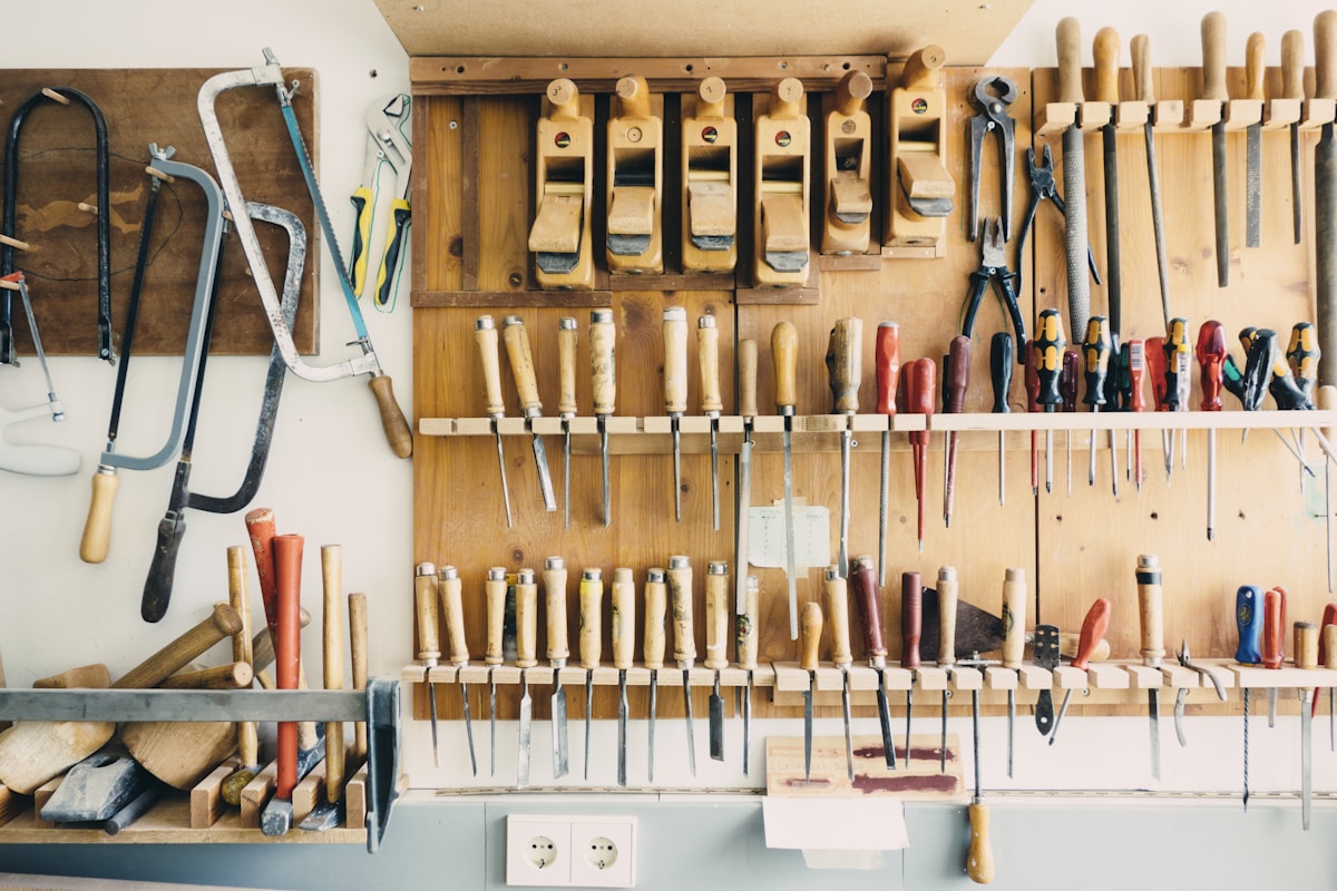 Tradesman's tools arranged in a workshop rack